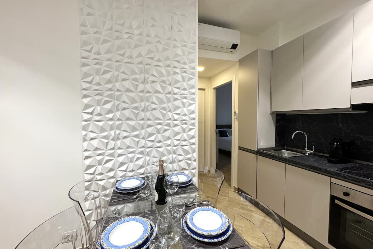 Soggiorno e cucina di Dimora Cabiria