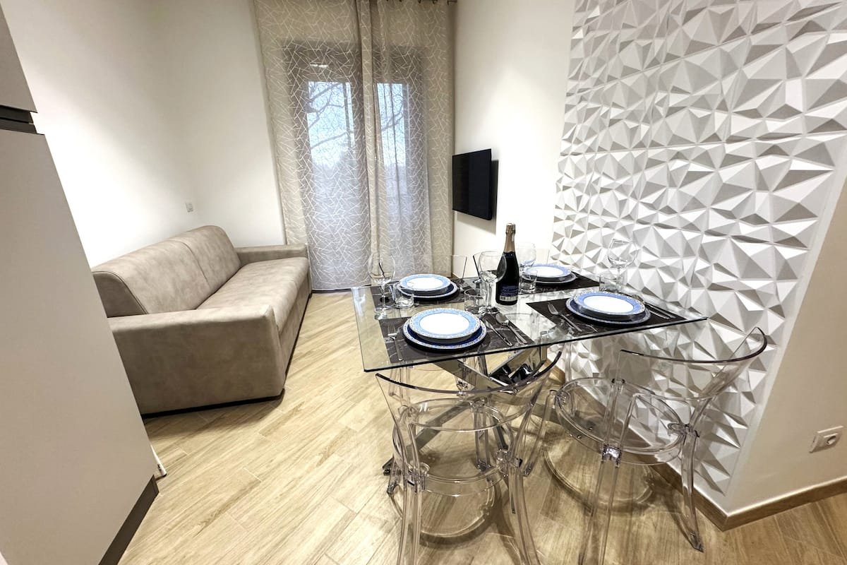 Soggiorno e cucina di Dimora Cabiria