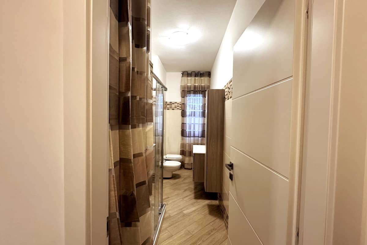 Bagno e lavanderia di Dimora Cabiria