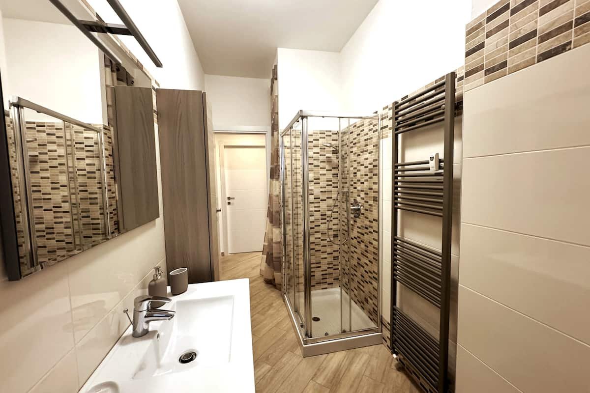 Bagno e lavanderia di Dimora Cabiria